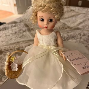 Madame Alexander doll new in box with stand and flower basket. Tags included